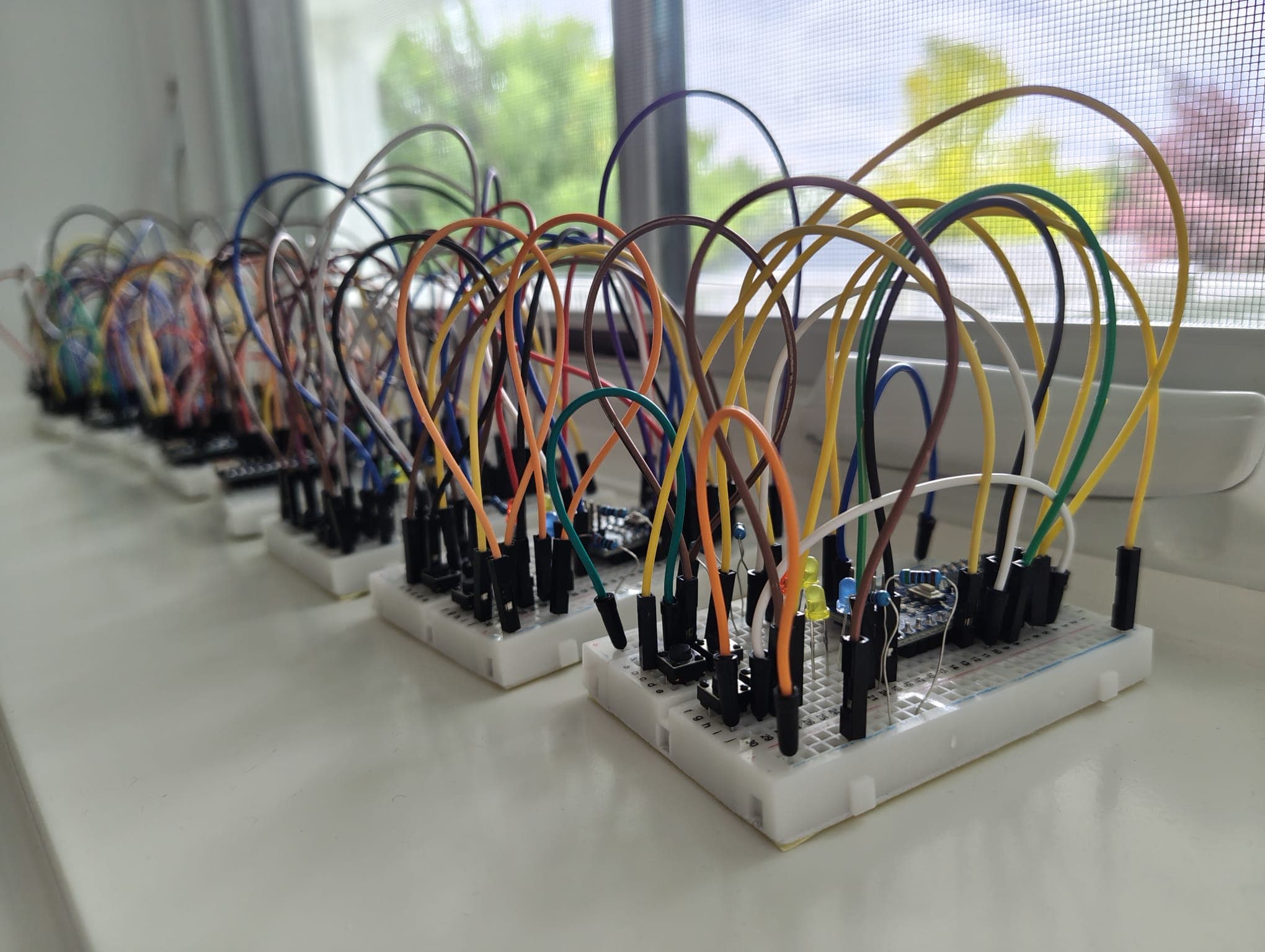 All of the students' boards lined up on the classroom windowsill after class
